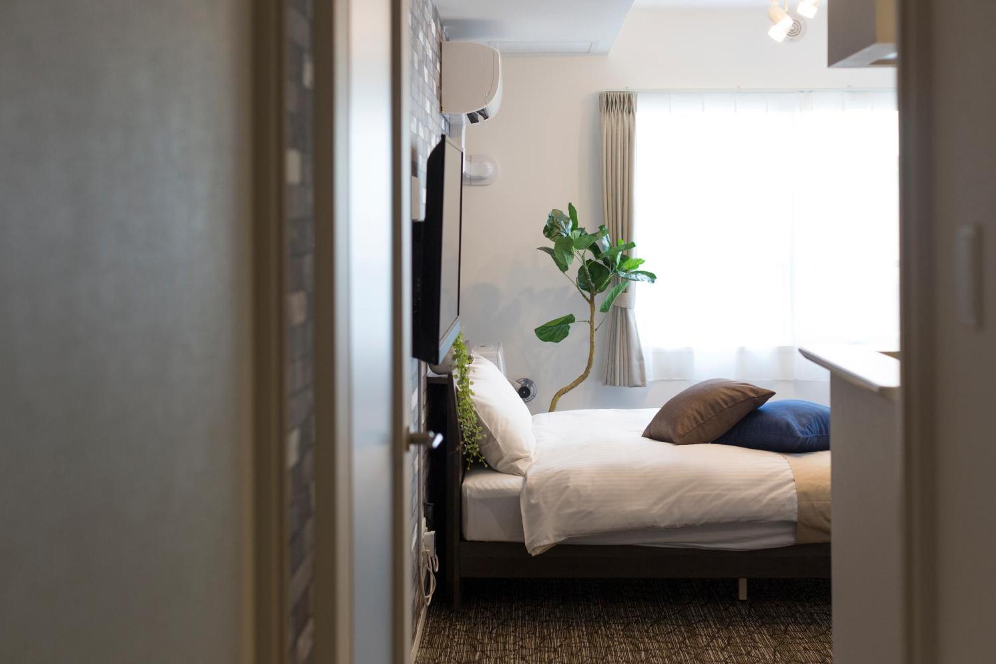 Hotel One'S Residence Sapporo Esterno foto